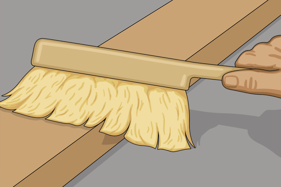 Borstar rent en slipad yta med borste